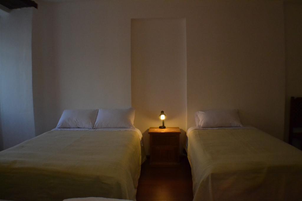 Heritage Inn Кіто Номер фото